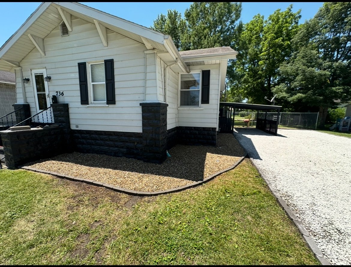 Finished gravel bed and lawn